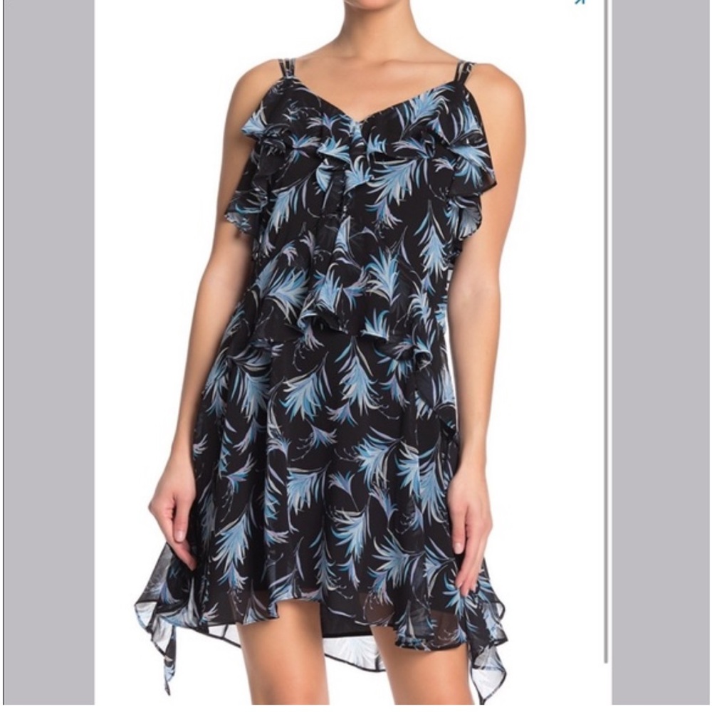 Chiffon Ruffled Palm Printed Sleeveless dress.